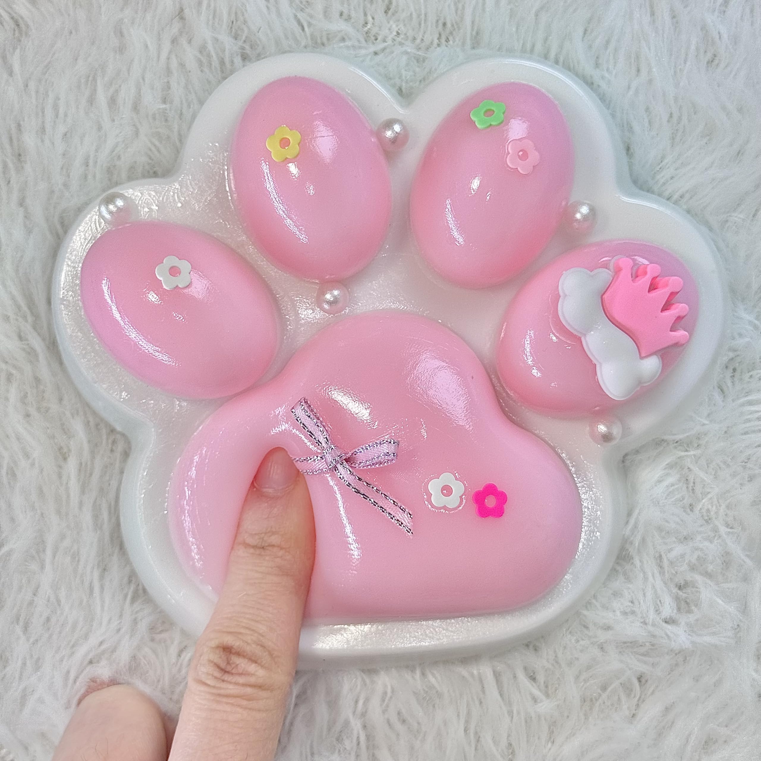 Ultra-soft sticky feel of Pawfect Tail Big Taba Squishy Paw