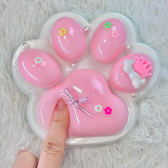 Ultra-soft sticky feel of Pawfect Tail Big Taba Squishy Paw