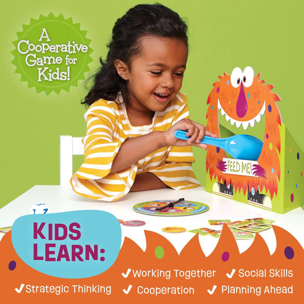 Peaceable Kingdom Feed the Woozle spoon supports fine motor play during feeding challenges.