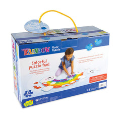 Completed Peaceable Kingdom Shimmery Rainbow Puzzle layout shows a vibrant learning moment.