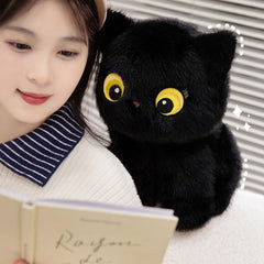 PEACH CAT black cat stuffed animal side view, ideal for cozy reading time.