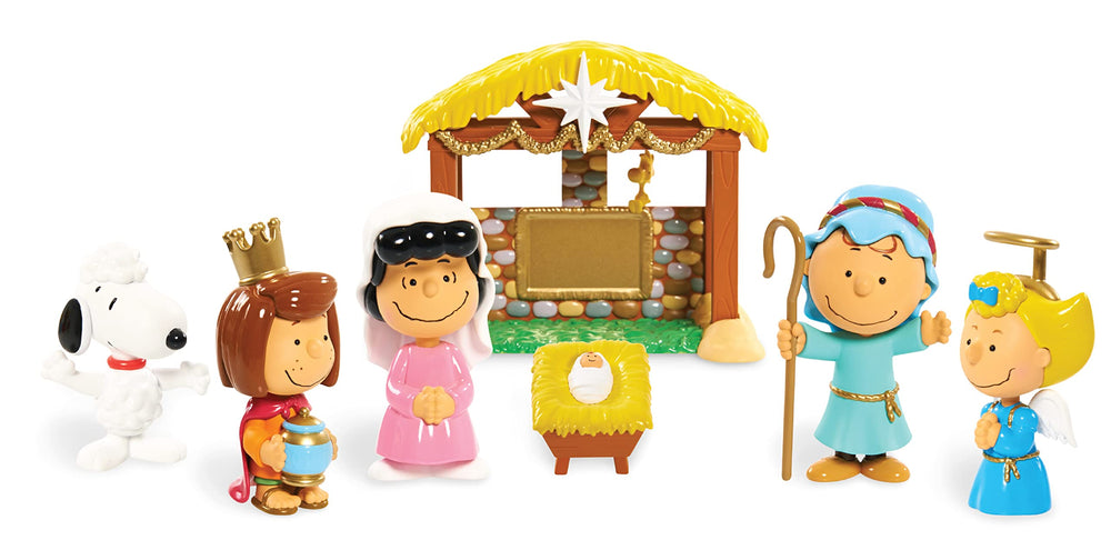 Peanuts Snoopy figure highlights the nativity scene, ideal for tabletop decor
