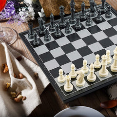 Pedolini travel chess set folds compactly for easy bag storage.