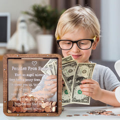Close-up of the acrylic window showing the coin slot on the Pennies From Heaven Bank