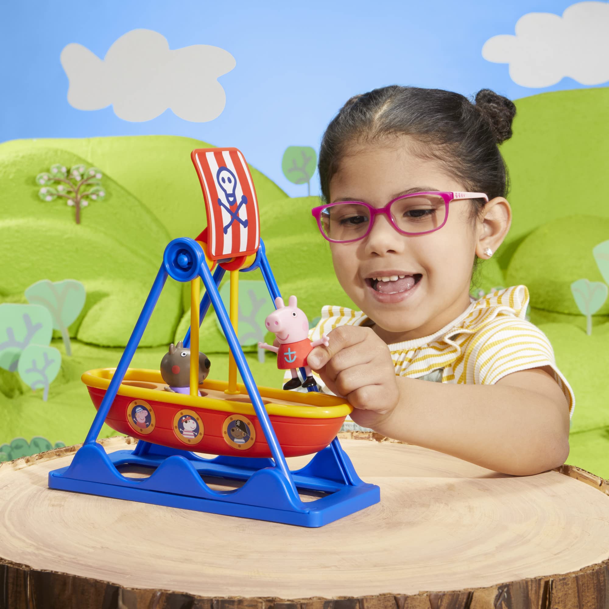 Swinging pirate ship ride adds motion to make-believe amusement park.