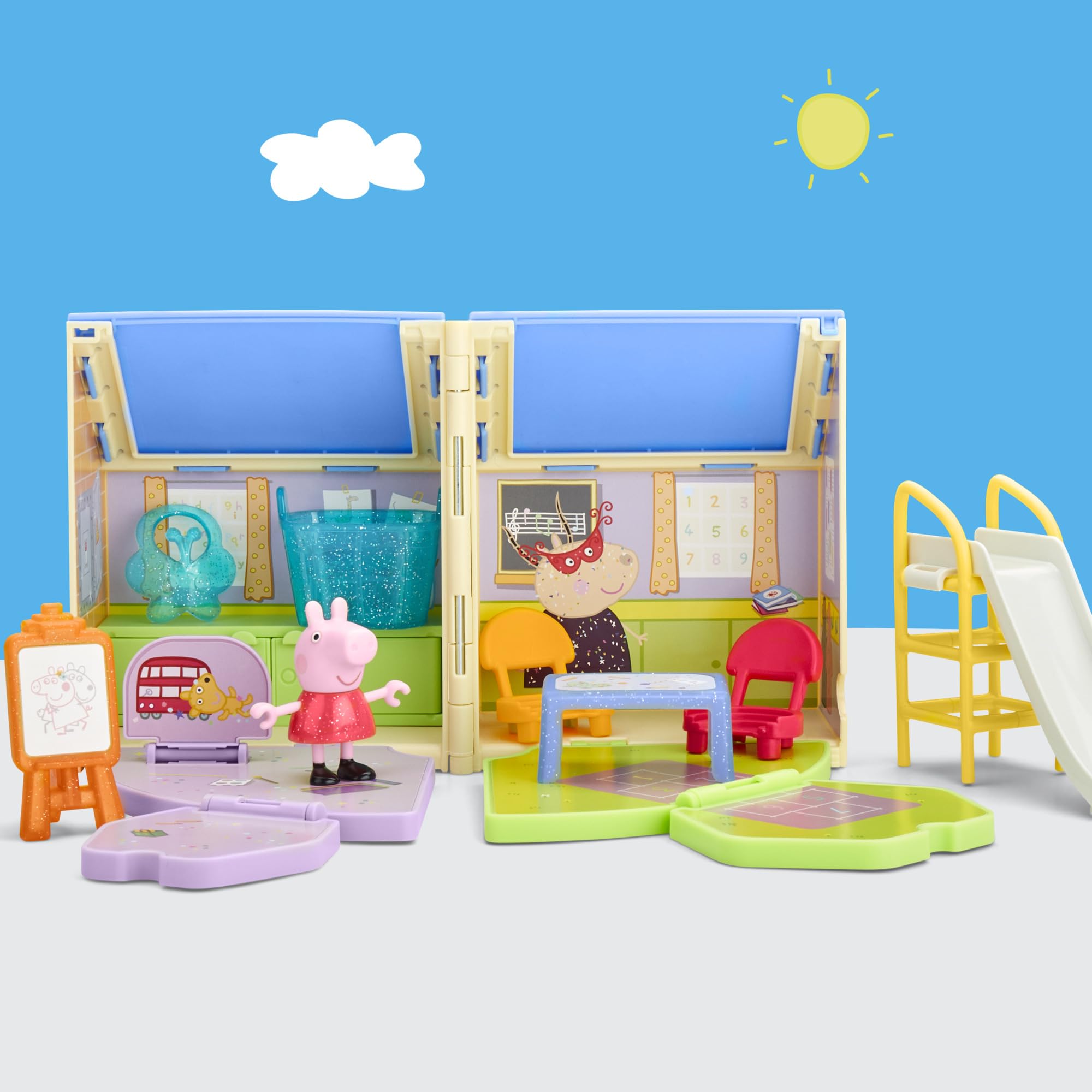 Peppa Pig art table and chairs scene supports pretend art sessions.