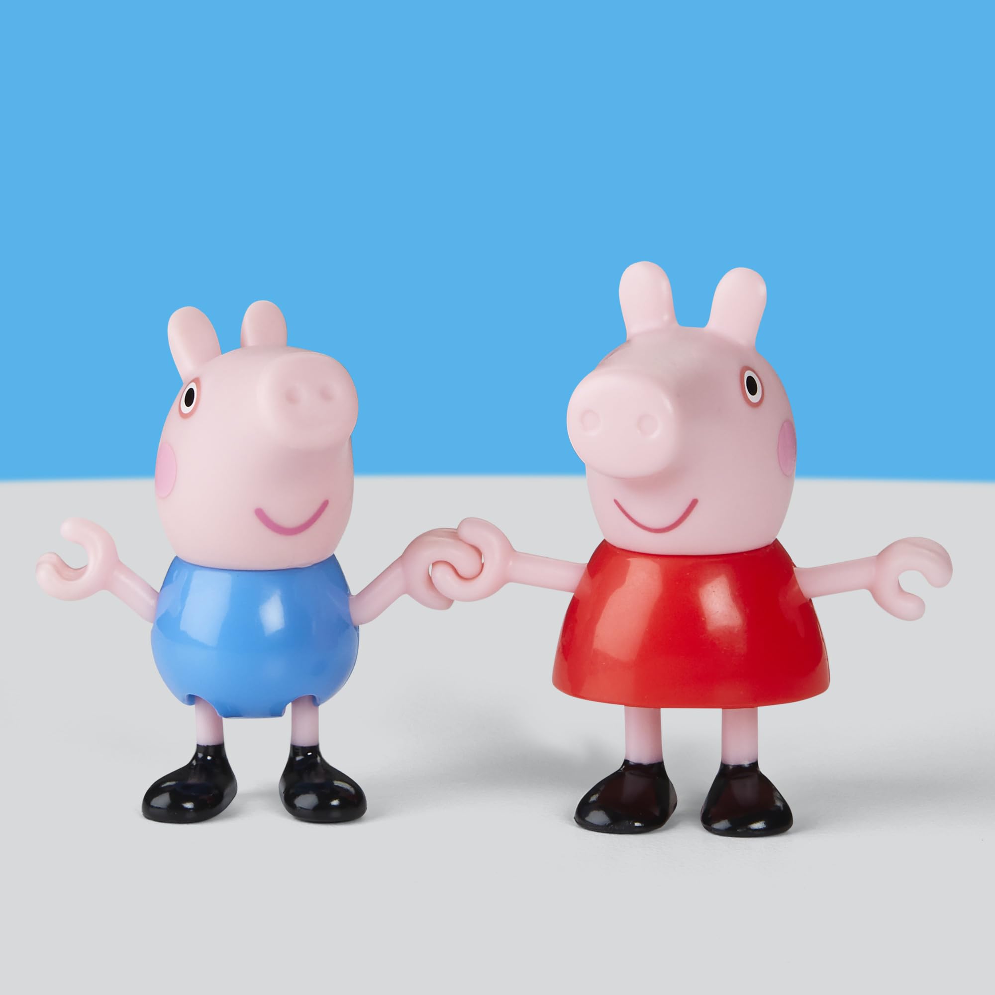 Figures hold hands to recreate warm family bonds in play.