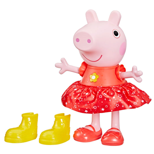 Peppa Pig Muddy Puddles Party doll in a glittery dress with yellow boots ready to dance.