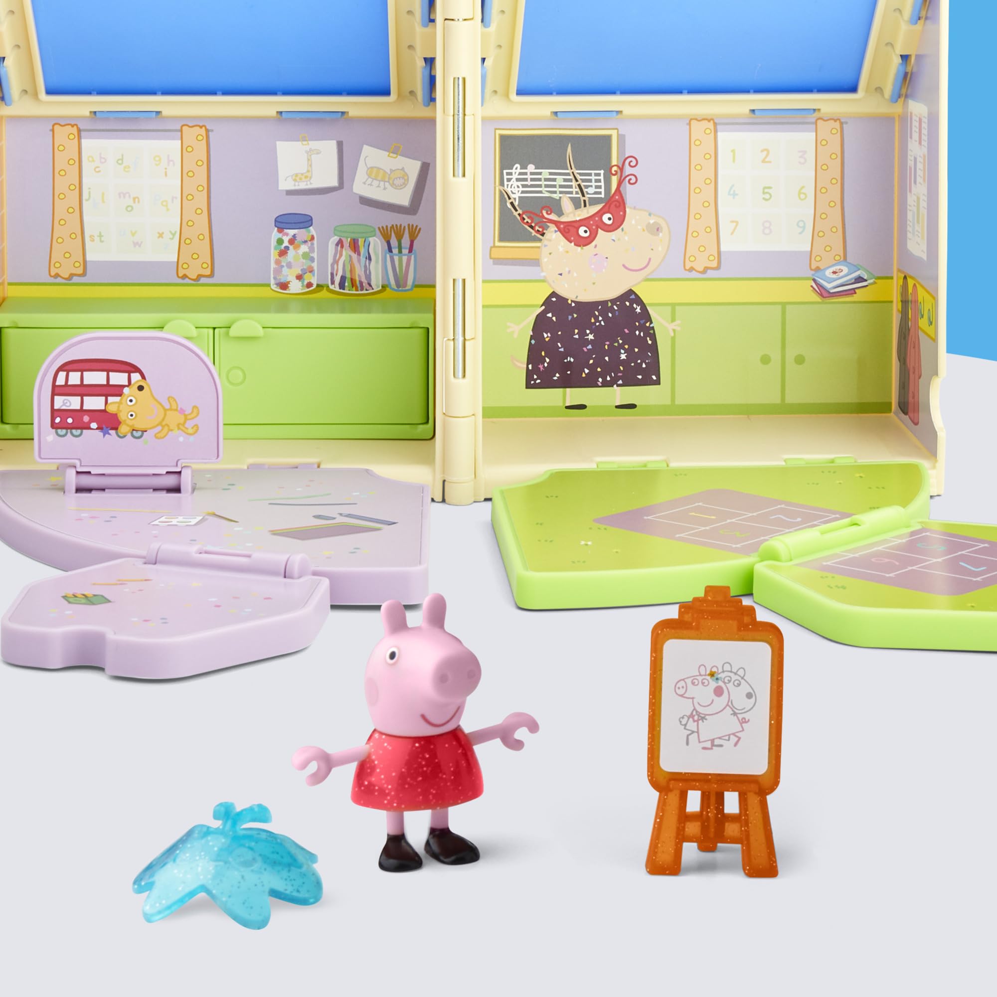 Storage compartment keeps all Peppa Pig playset pieces organized after playtime.