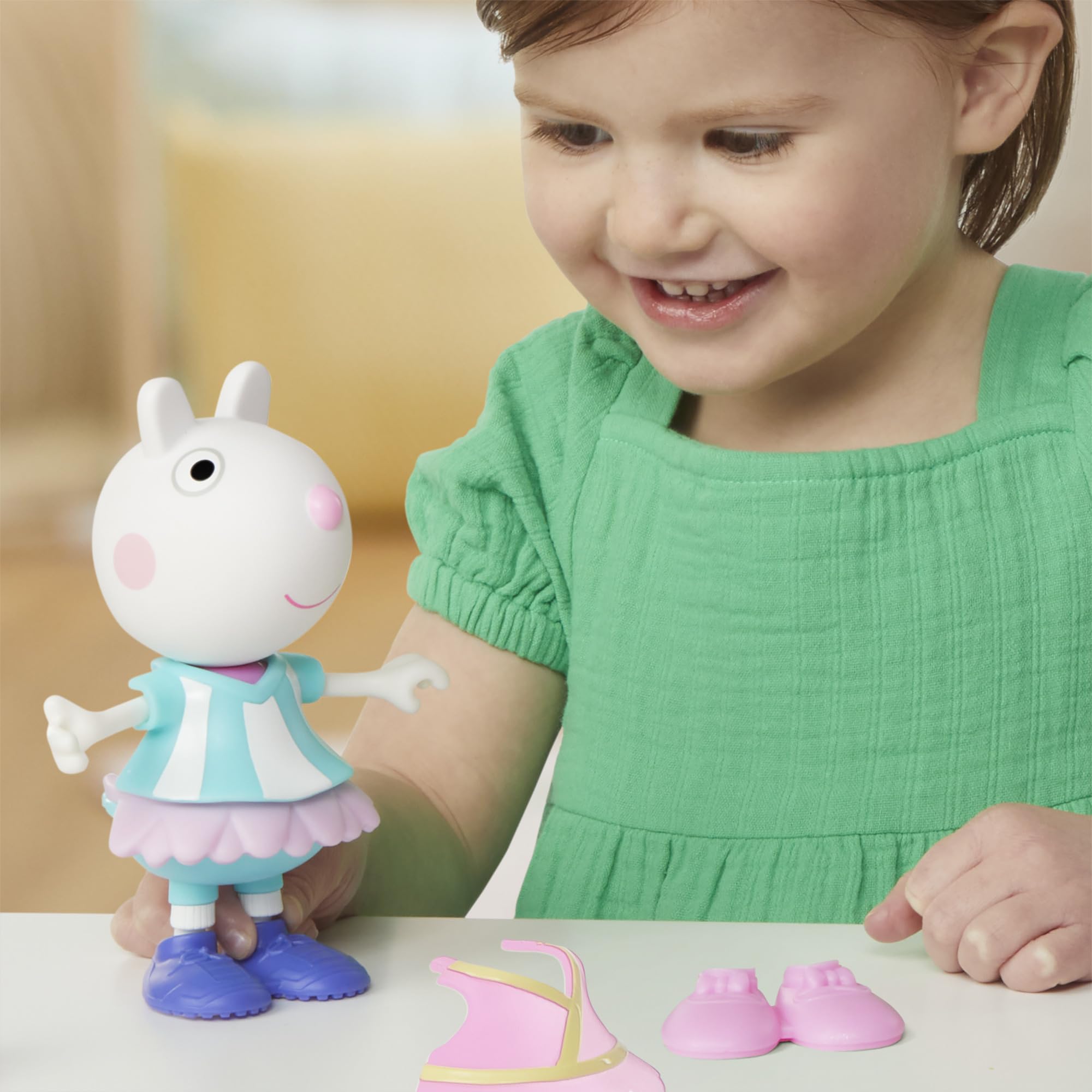 Peppa Pig Suzy Sheep sneakers accessory makes pretend runs easier in dress-up play.