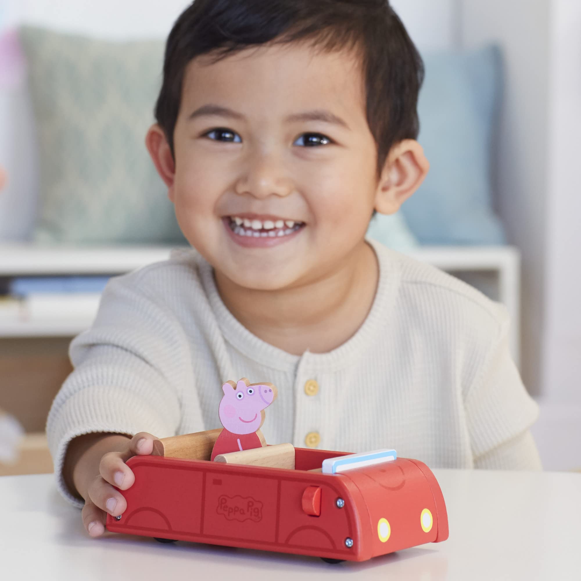Wooden Peppa Pig toy set supporting sustainable, screen-free play