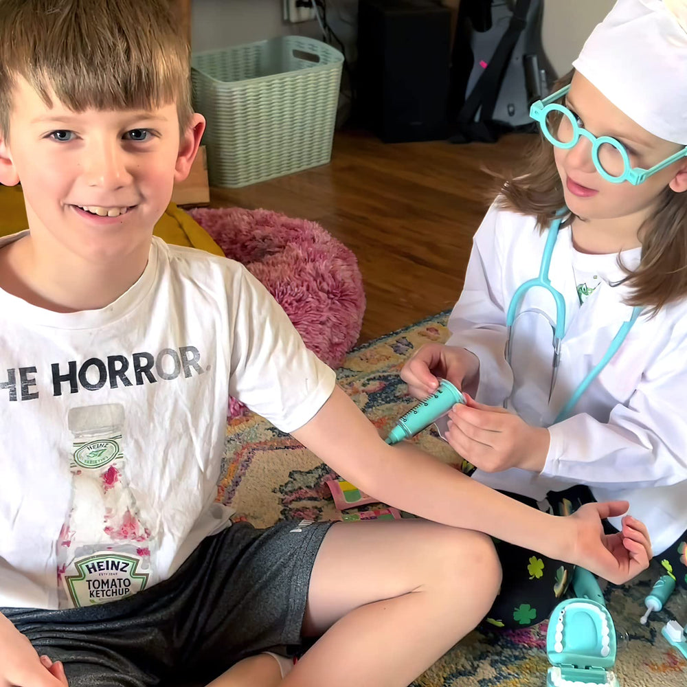 Phobby syringe with light feature for interactive pretend play