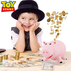 PHOCAS Hairphocas pink piggy bank child playing with a colorful savings toy.