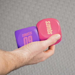 Phoenix Fitness Exercise Dice basic moves top view highlighting push-ups and squats.