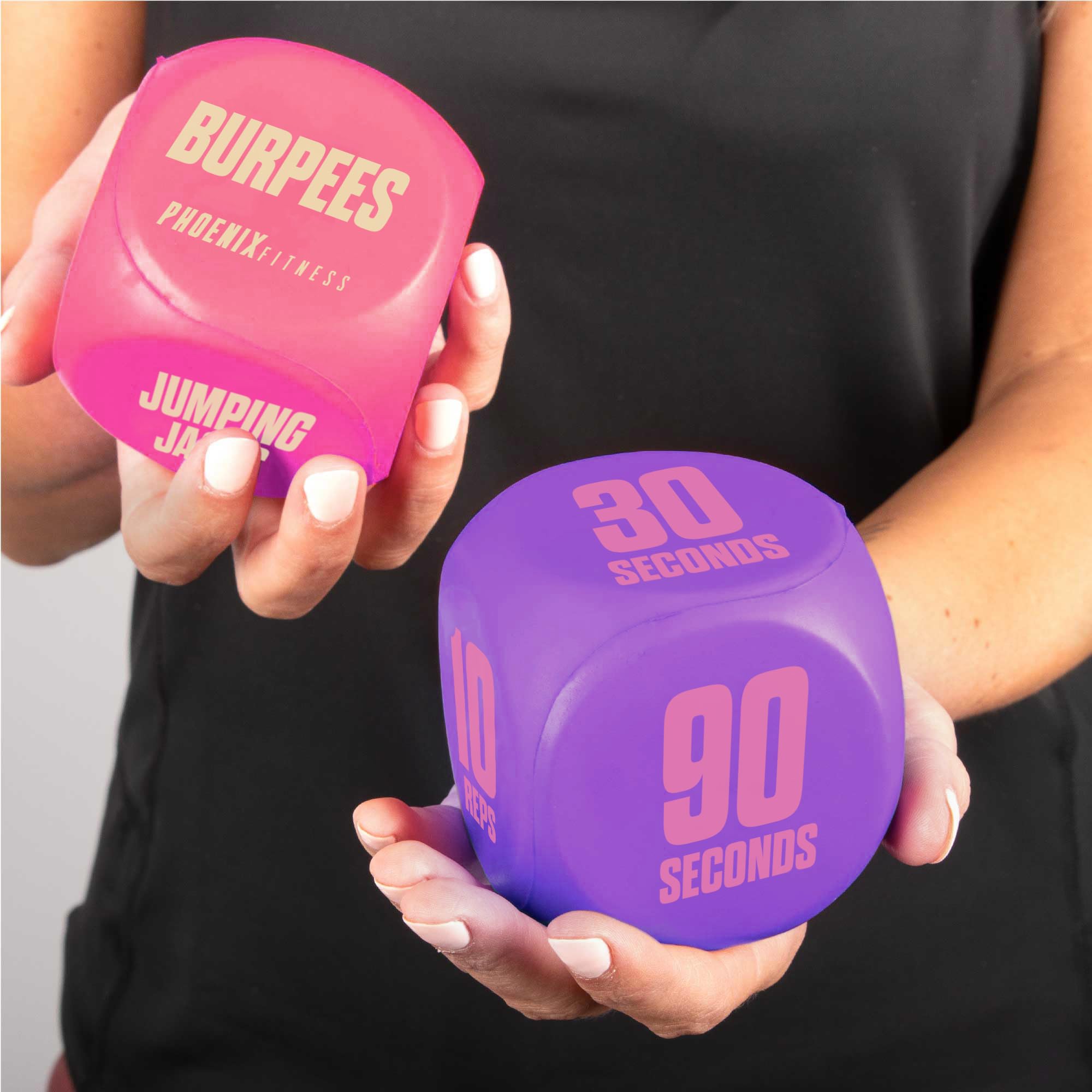 Phoenix Fitness Exercise Dice pink side view showing two-piece setup for varied routines.