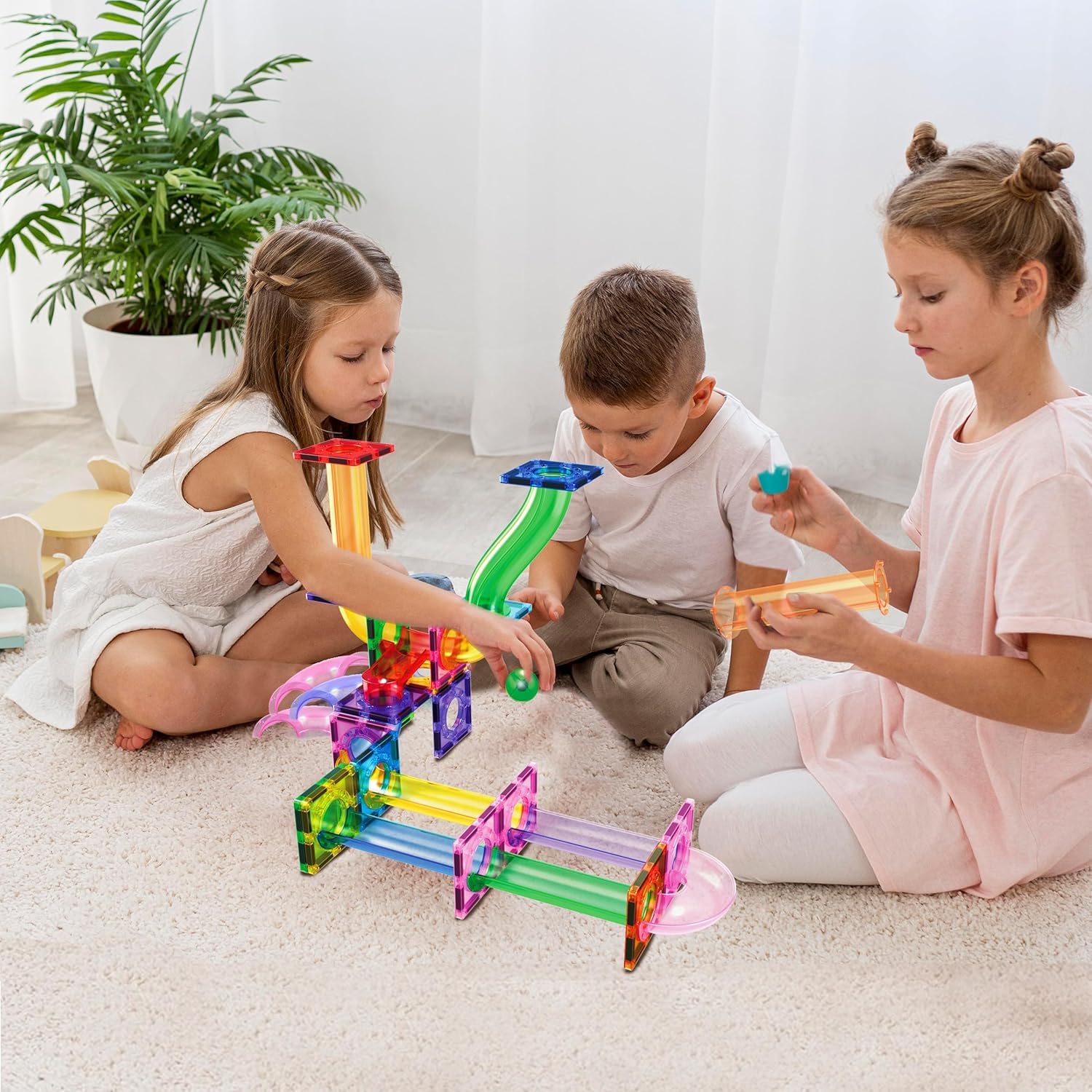PicassoTiles color blocks create towers that develop spatial reasoning during play.