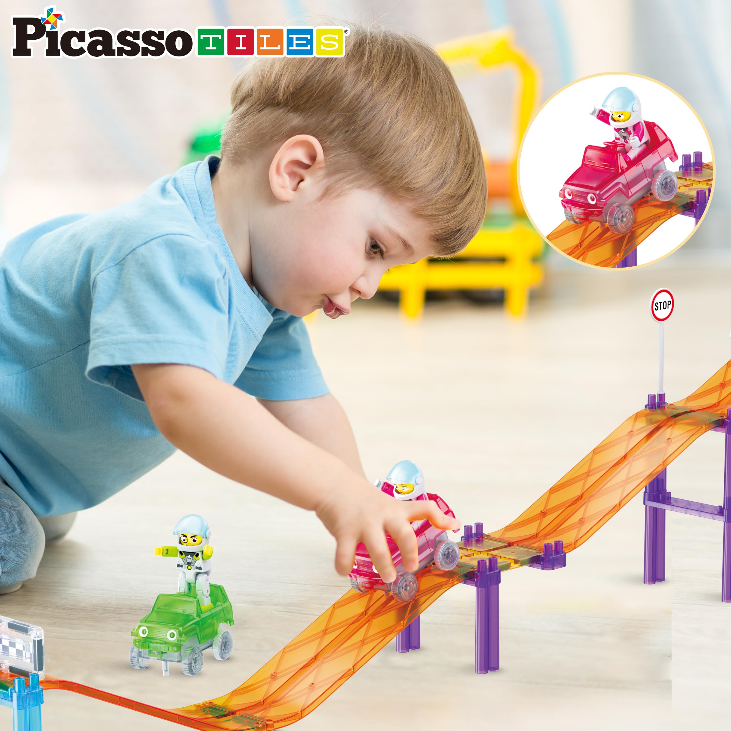 PicassoTiles vehicles with character figures riding the magnetic track