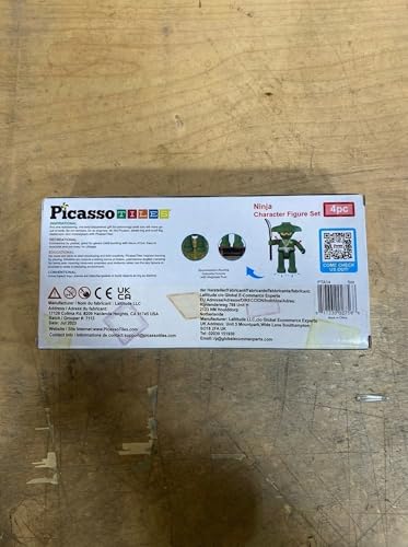 PicassoTiles Ninja action characters with magnetic tiles on a playmat