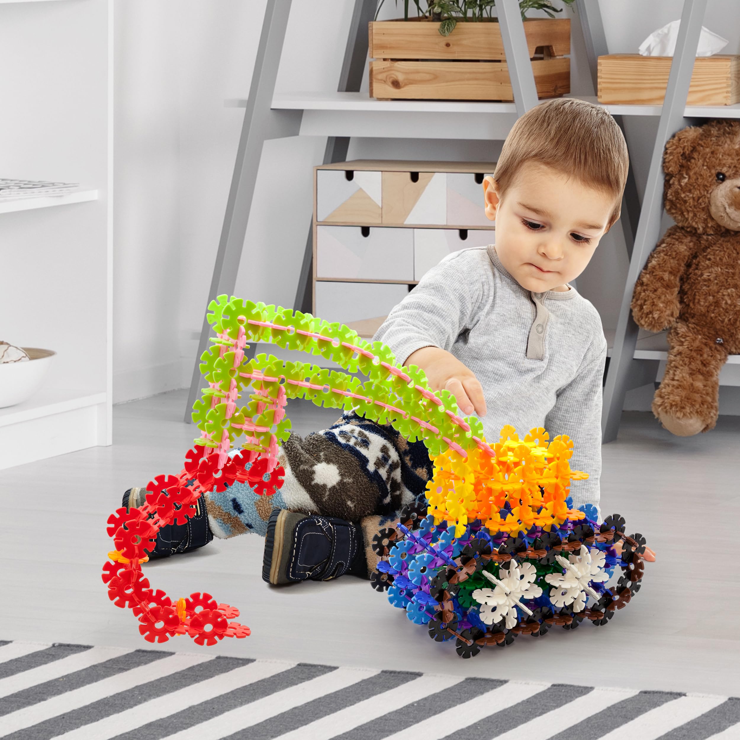 PicassoTiles blue STEM discs support spatial reasoning through hands-on construction.