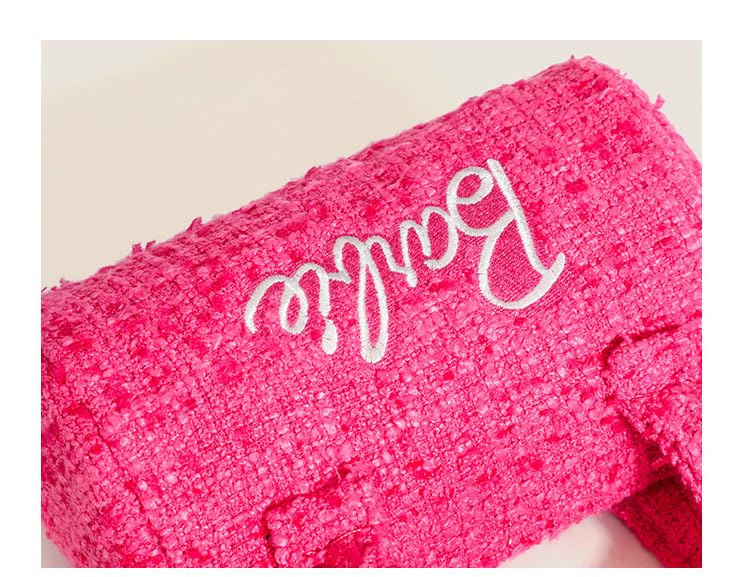 Pink Doll inside compartments keep phone, wallet, and essentials organized