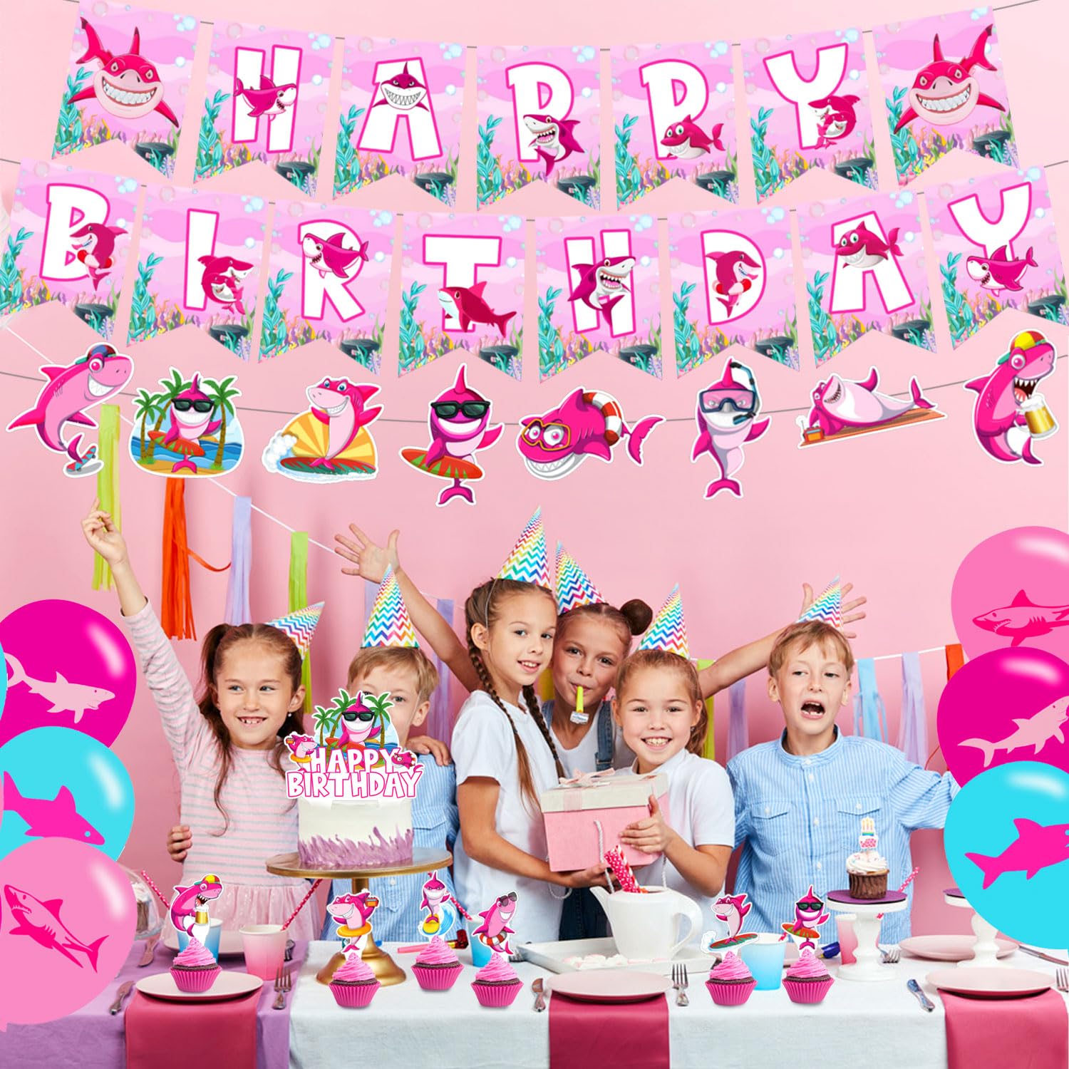 Pink Shark cake topper elevates the center dessert with a charming focal point