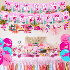 Pink Shark table centerpieces create cute focal points for the birthday table