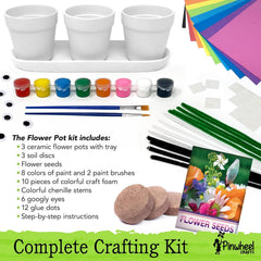 Pinwheel Crafts paint set and brushes close-up for vibrant color play.