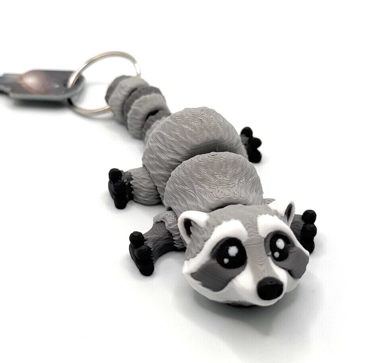 Platypus articulating keychain in color, delivering a tactile fidget and eye-catching accessory.