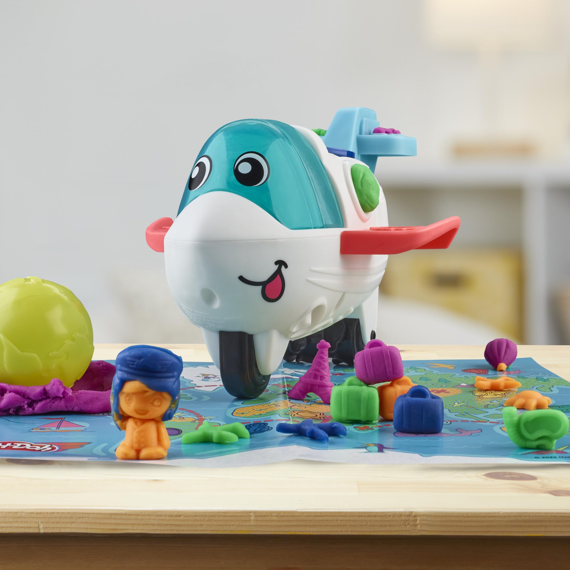 Play-Doh Airplane Explorer Set luggage roller adds fun travel shapes.