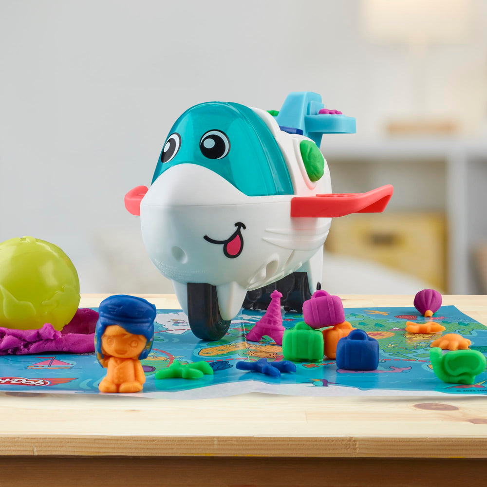 Play-Doh Airplane Explorer Set luggage roller adds fun travel shapes.