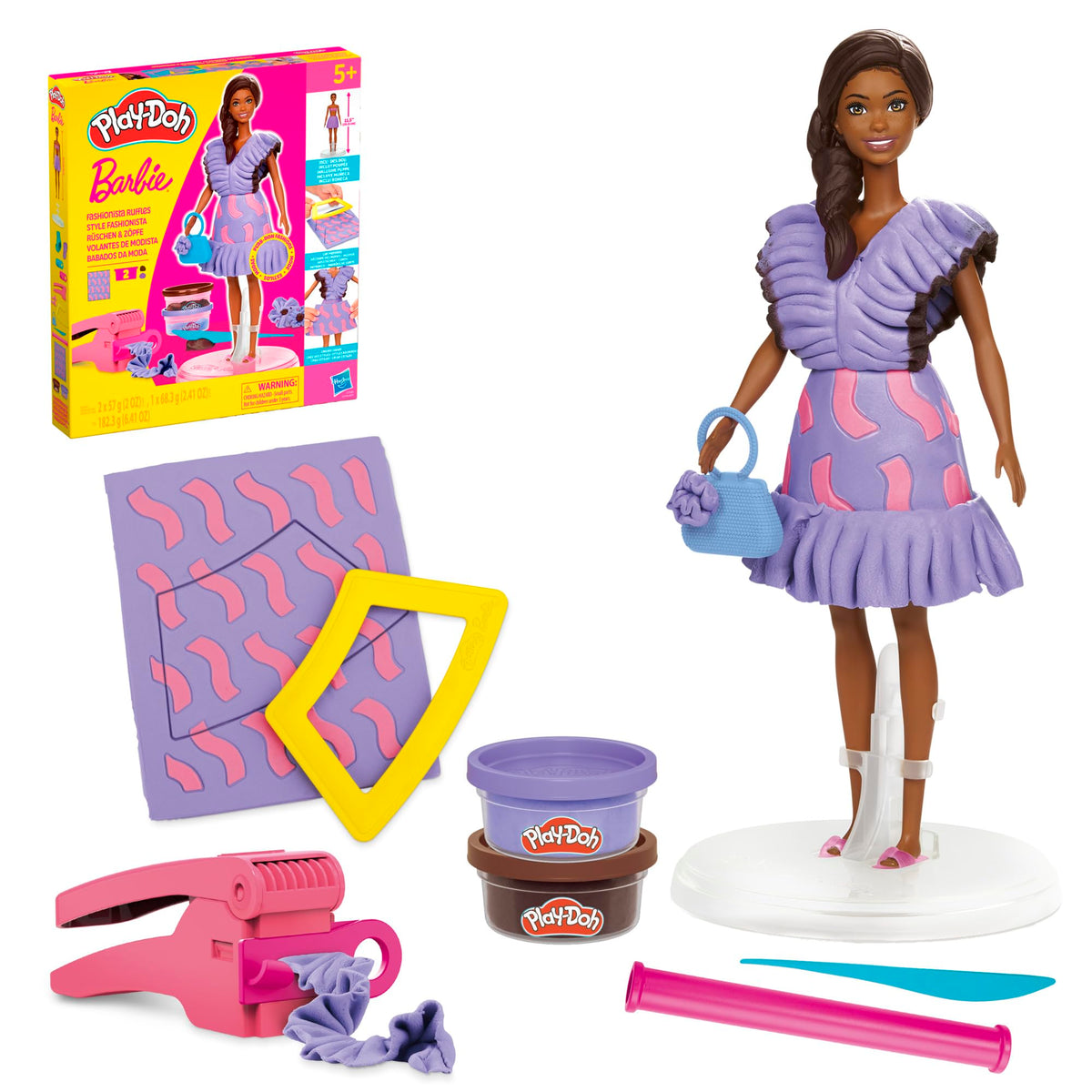 Play-Doh Barbie Fashionista Ruffles Set: doll on stand wearing a finished outfit.