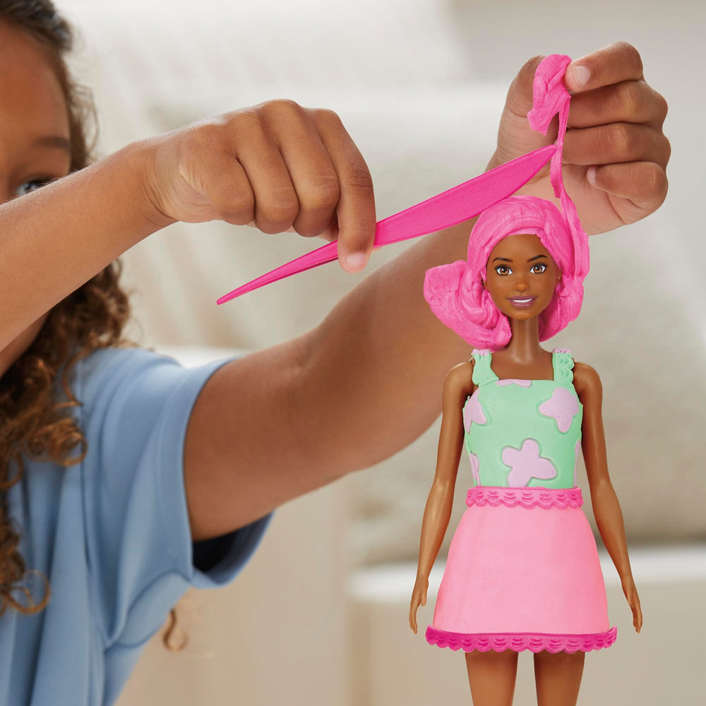 Play-Doh Barbie Garden Party encourages imaginative fashion play.