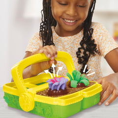 Play-Doh Blooming Flowers garden box doubles as storage for tools.