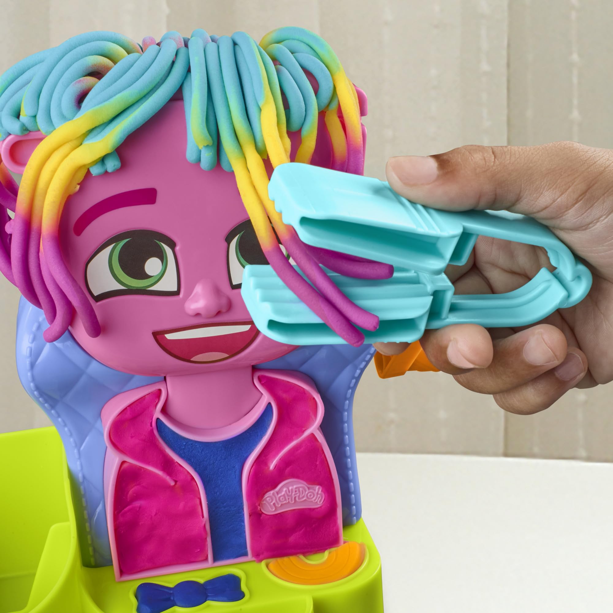 Play-Doh crimper tool creates wavy textures.