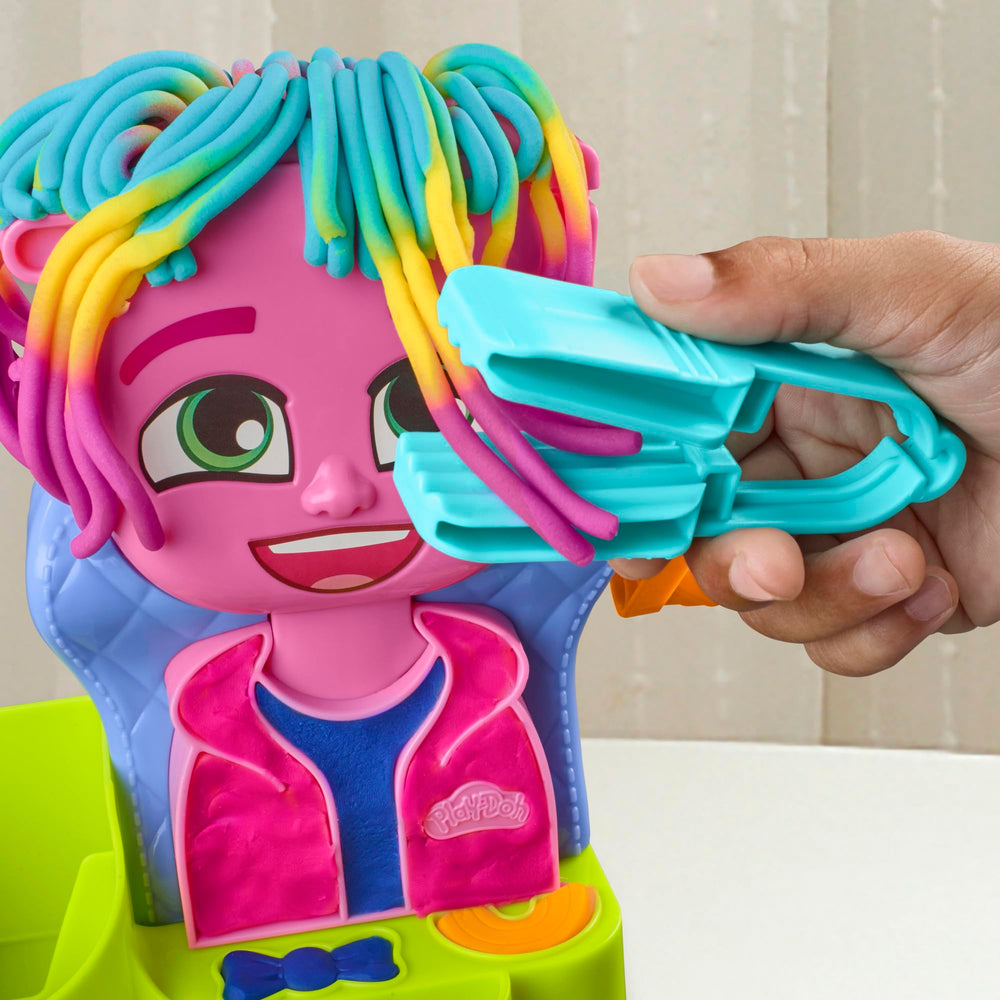 Play-Doh crimper tool creates wavy textures.