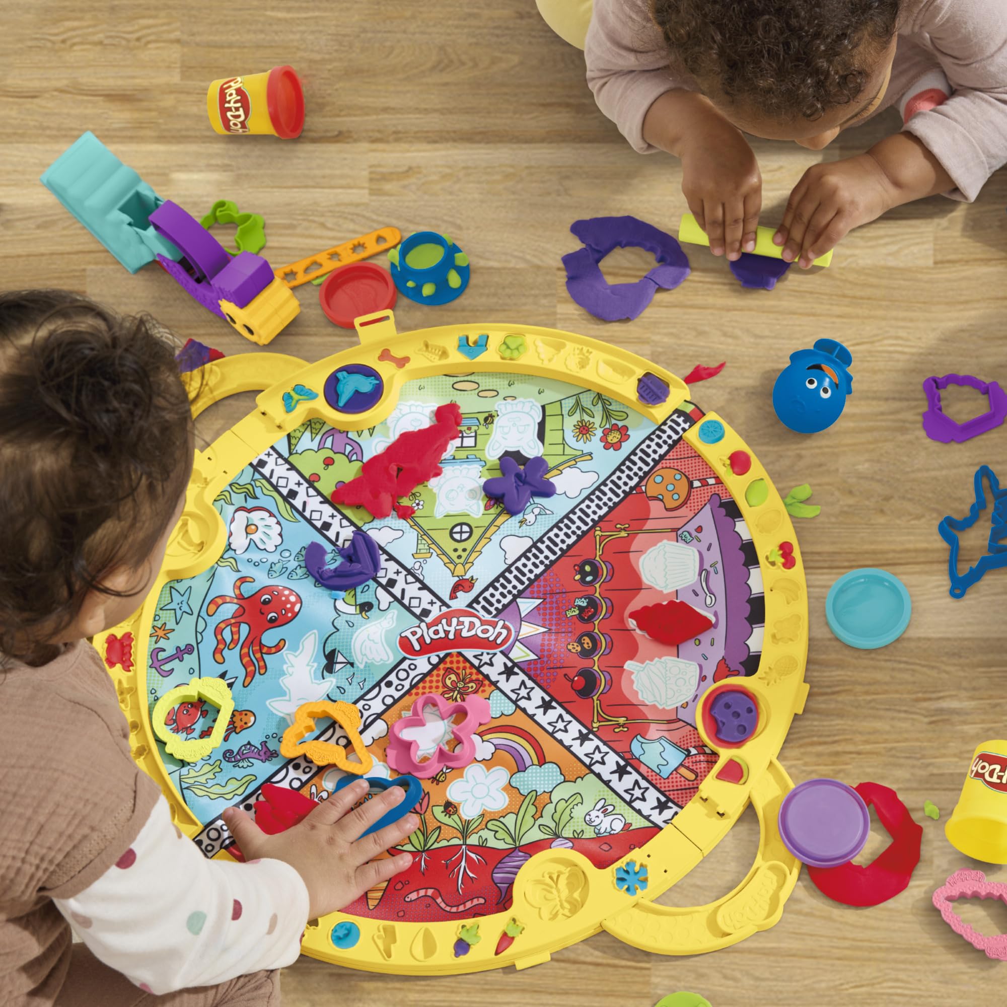 Play-Doh face stamper four-sided tool in use