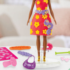 Play-Doh flowers stampers create charming floral accents on outfits.