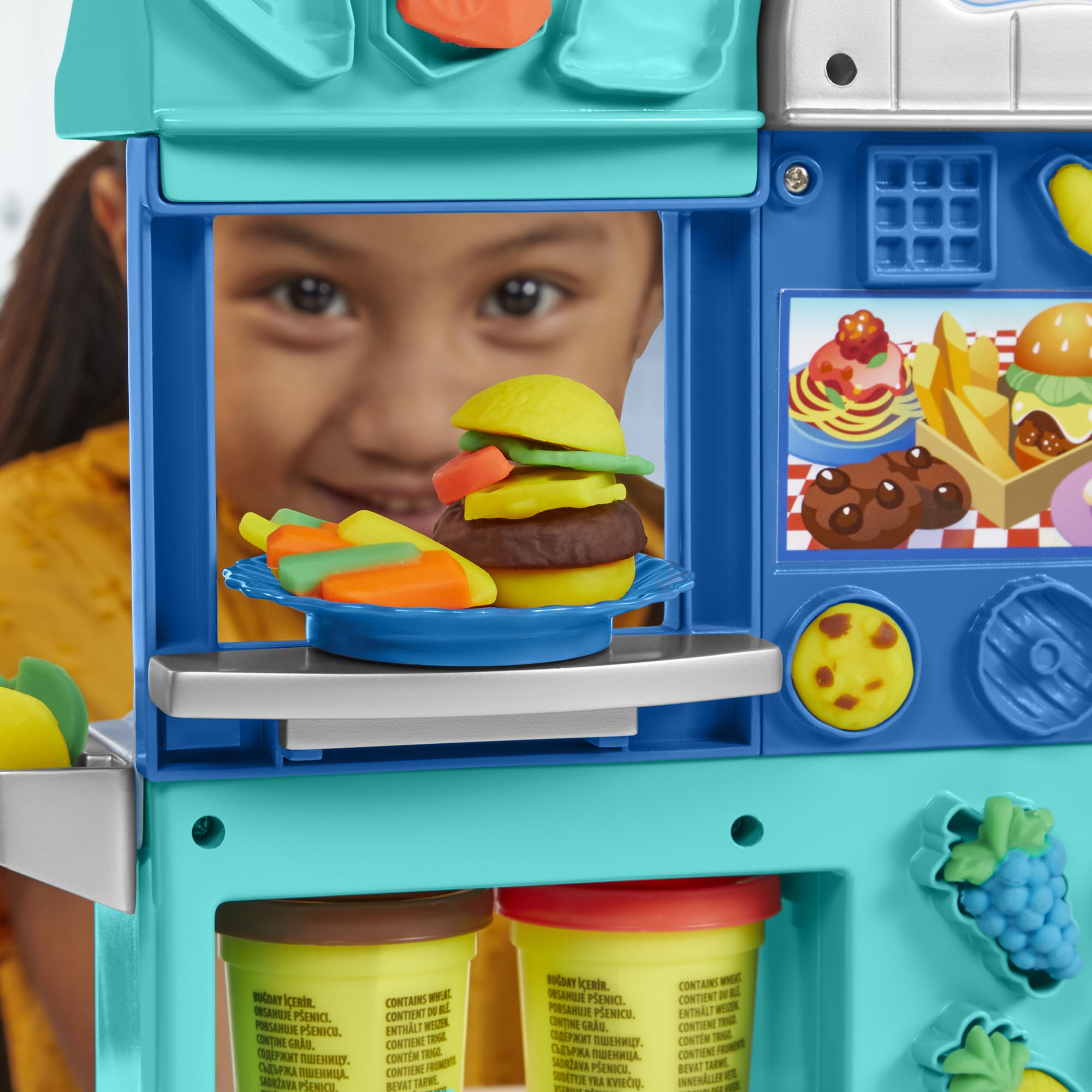 Play-Doh Kitchen Creations Busy Chef's Restaurant playset prep station and griddle in motion