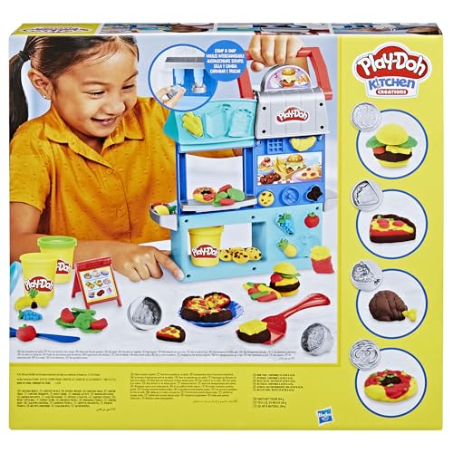 Play-Doh Kitchen Creations Busy Chef's Restaurant playset stamping action with burger stampers