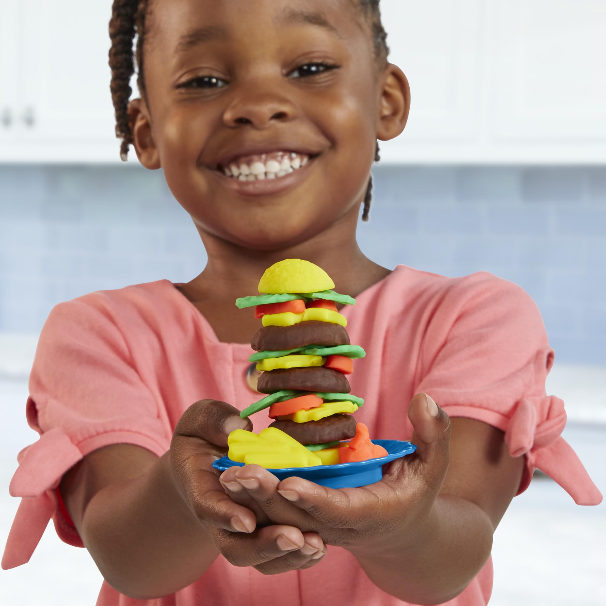 Play-Doh Kitchen Creations Busy Chef's Restaurant playset shares creations through window pass