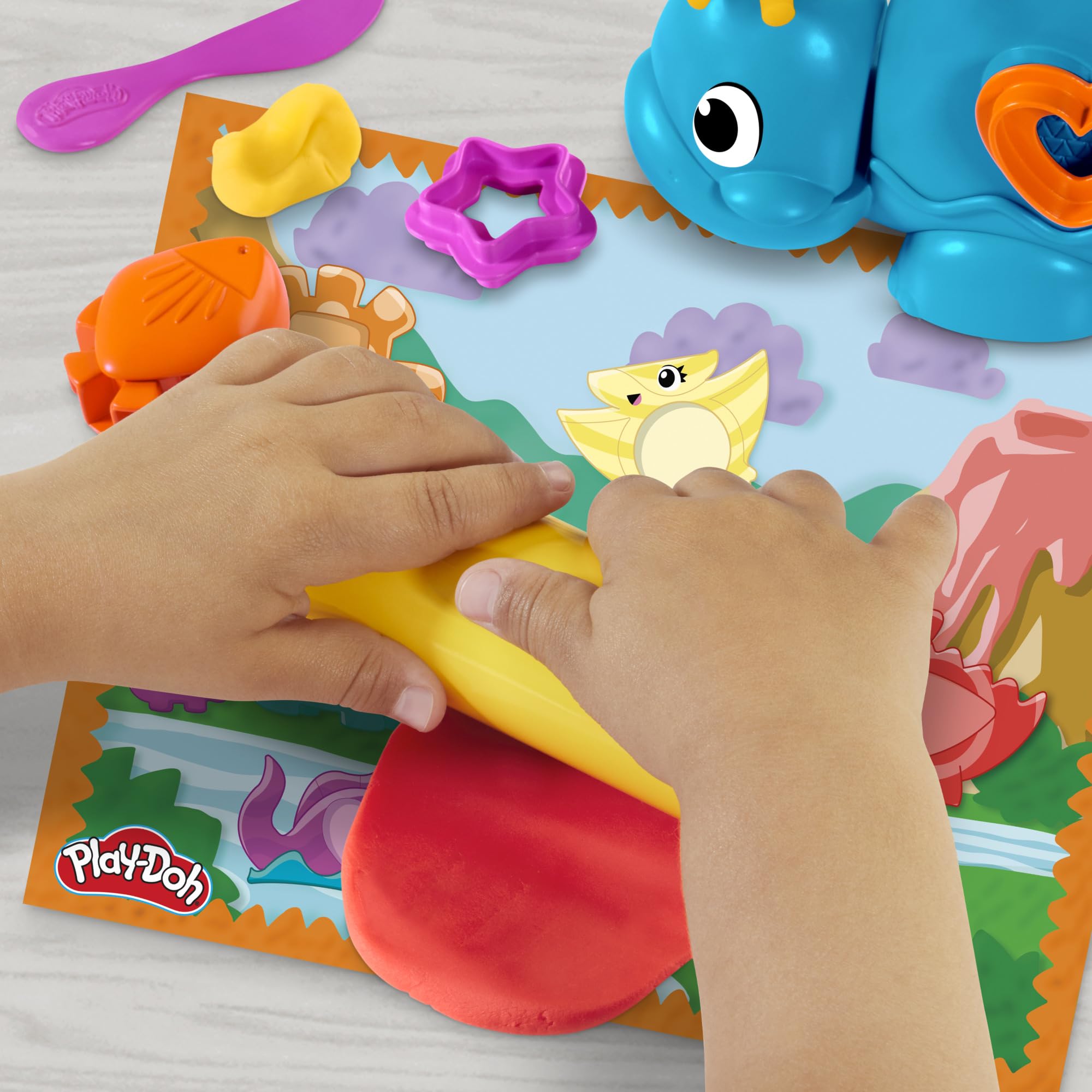 Play-Doh Shapes & Colors Dino Starter Set tools displayed for hands-on shape cutting practice