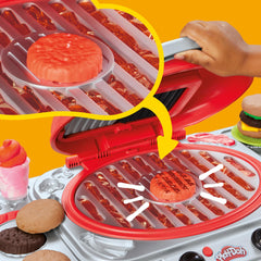 Play-Doh Sizzlin' Grill Playset sizzle sounds enhance imaginative cooking moments.