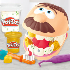 Play-Doh toothbrush tool encourages brushing practice within a playful dental routine.