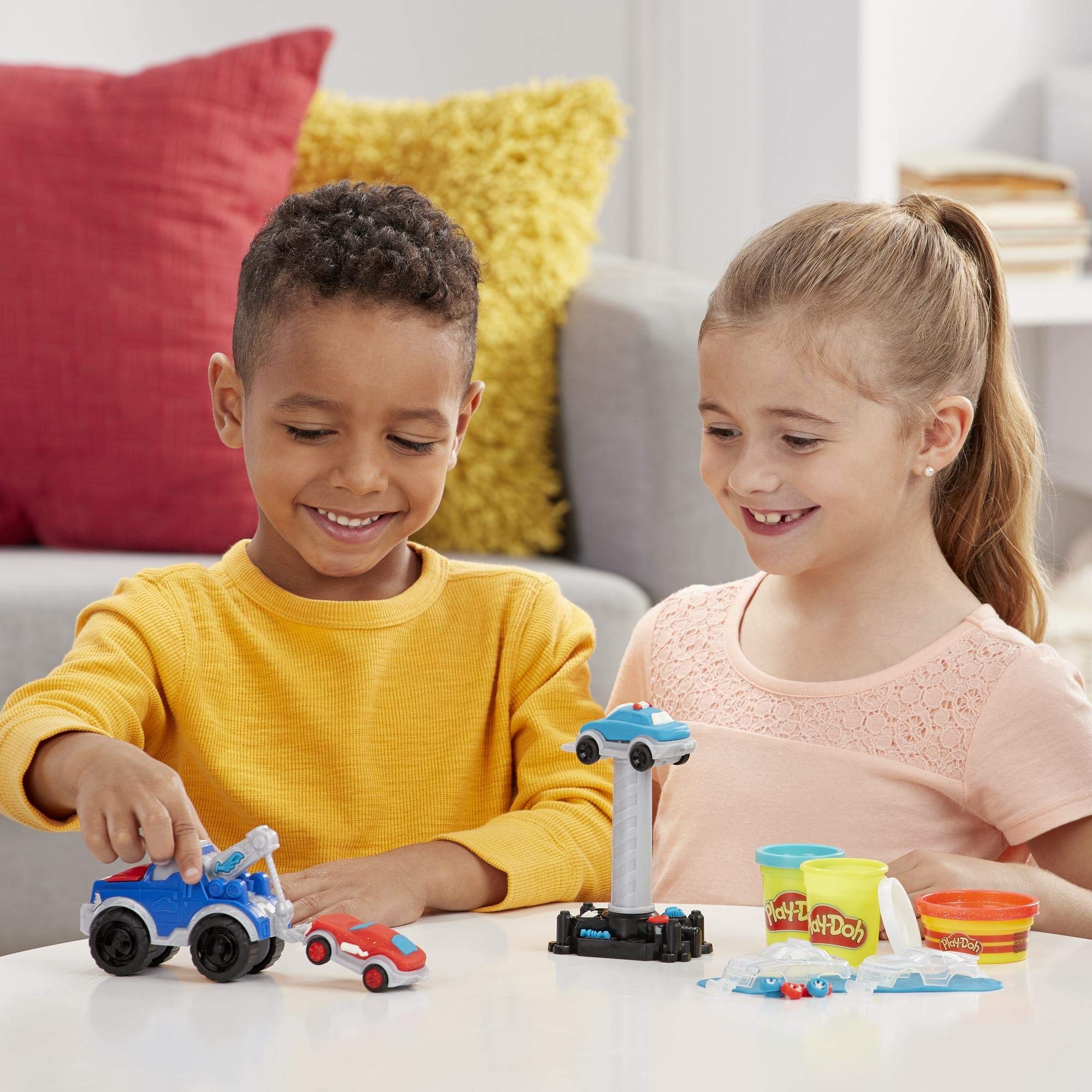 Play-Doh Wheels kid playing supports fine motor skills and storytelling.