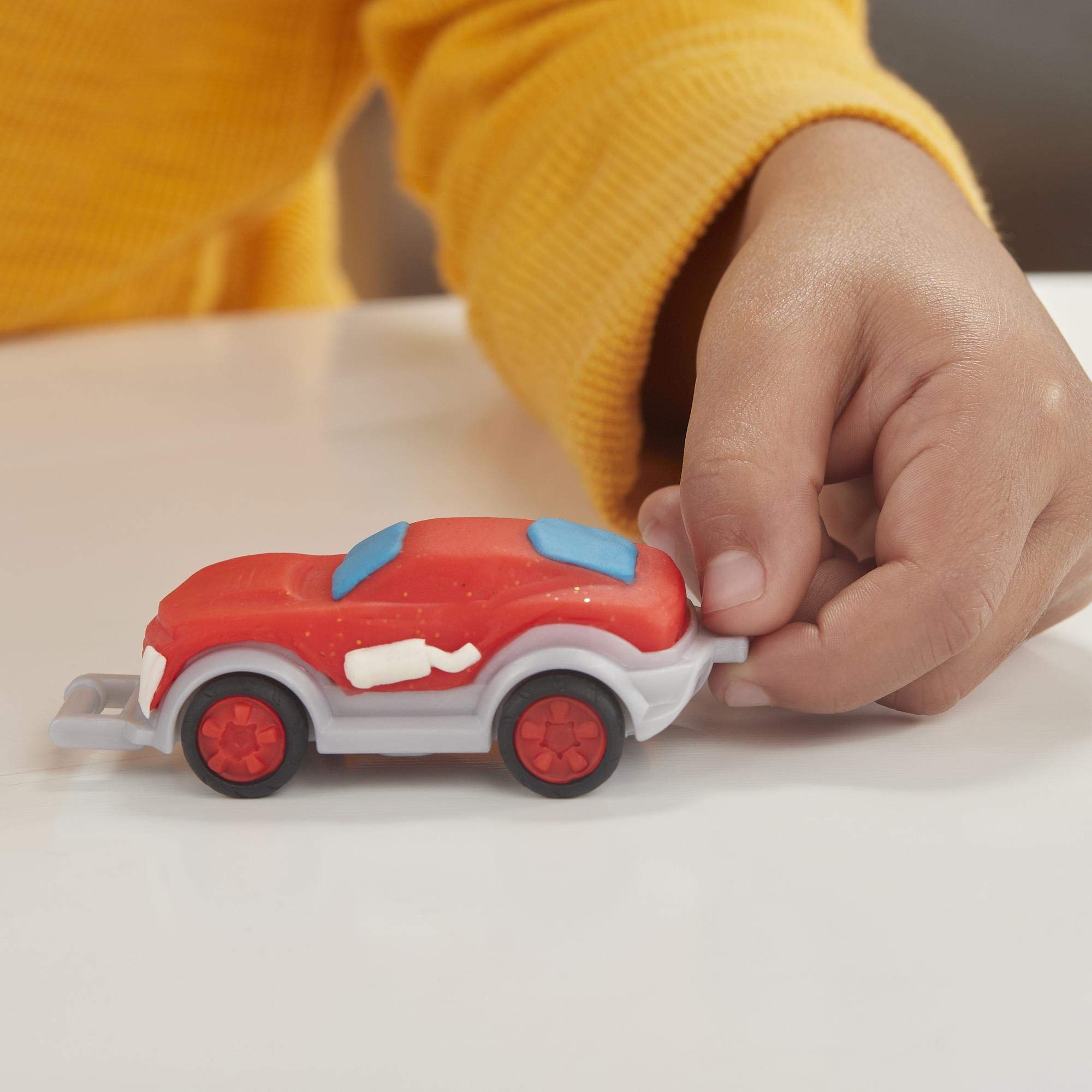 Play-Doh Wheels Police car mold supports imaginative rescue-themed play.