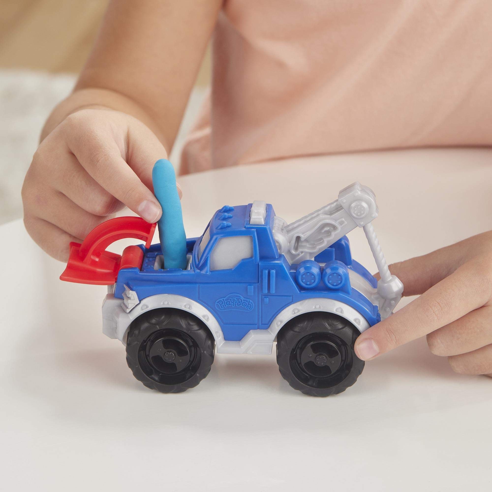 Play-Doh Wheels Race car mold enables speedy clay builds.