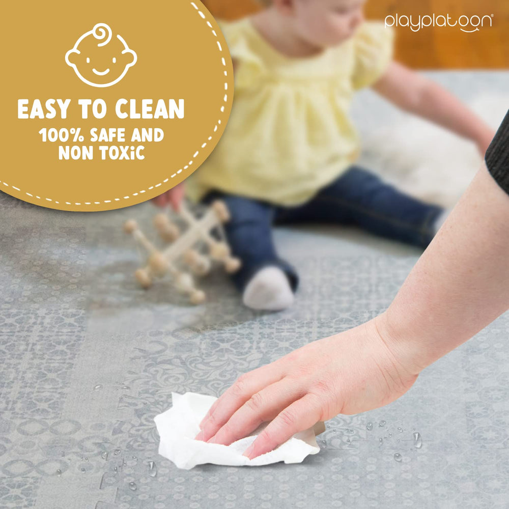 Neutral grey boho pattern on Play Platoon mat complements nursery decor
