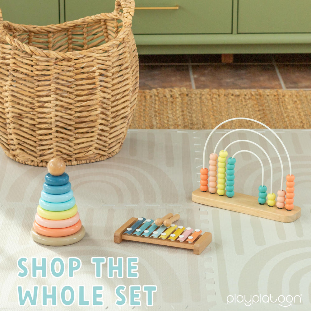 Play Platoon wooden abacus in a cozy playroom setting