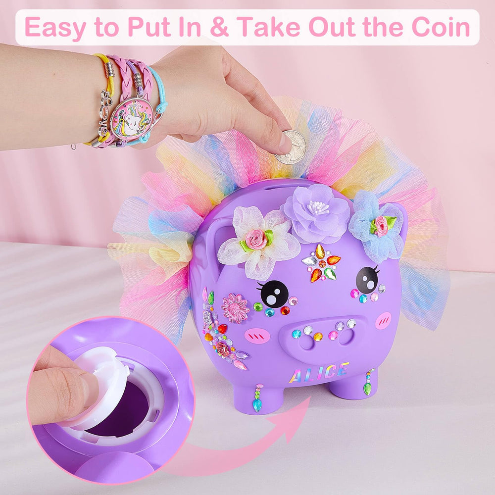 Play Tailor piggy bank bottom knob enables easy coin access