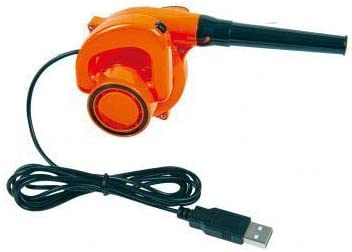 Compact six-inch blower on a desk for crumbs and dust bunnies.